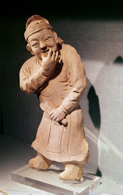 Estatueta de um ator assobiando, de Jiaozuo, Henan, Yuan Dynasty (1271-1368) (terracota) de Chinese School