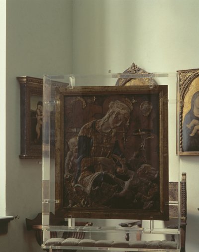 Madonna and Child (gesso policromado, madeira, couro, vidro) de Donatello