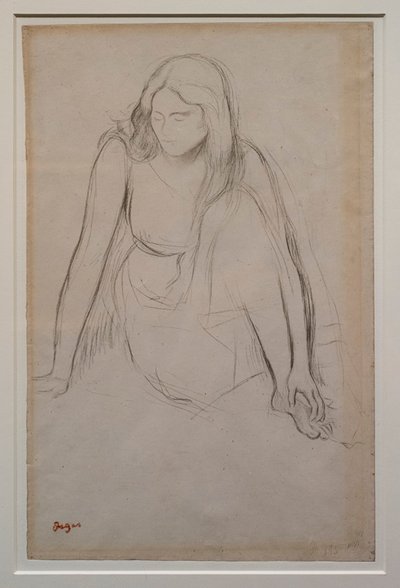 Mulher sentada à beira da água. Por volta de 1867-1868. Lápis preto sobre papel de velino. de Edgar Degas
