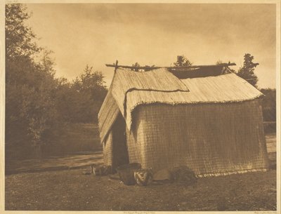 Uma casa de esteira - Skokomish de Edward S. Curtis