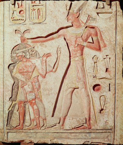 Ramsés (1279 - 1213 a.C.) ferindo os seus inimigos (relevo em calcário pintado, 19ª Dinastia) de Egyptian 19th Dynasty