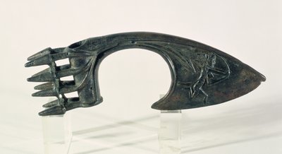 Lâmina de machado representando um arqueiro, possivelmente de Lorestan, Irão, final do 2º ou início do 1º milénio a.C. (bronze) de Elamite