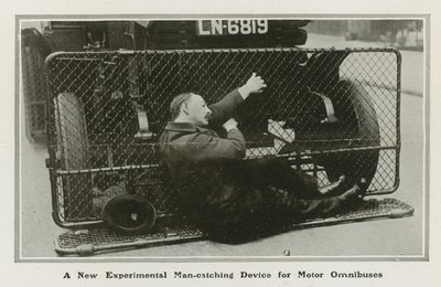 Dispositivo de captura de homem para omnibuses de motor de English Photographer