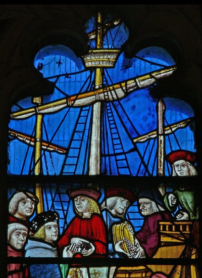 Janela SaEw retratando uma cena de uma lenda de São Nicolau: os navios graneleiros descarregam em Myra de English School