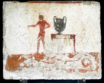 Arte etrusca: uma efebe jovem nua perto de uma mesa onde se coloca um vaso. Fresco do túmulo do "mergulhador". Do cemitério do sul de Paestum. 480-470 AC. Museo Archeologico Nazionale, Paestum de Etruscan