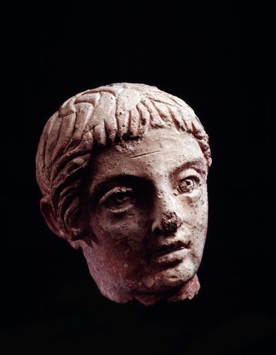 Civilização etrusca: cabeça de jovem do templo de Belvedere, em Orvieto - séc. V-IV aC Diâm 13 cm de Etruscan