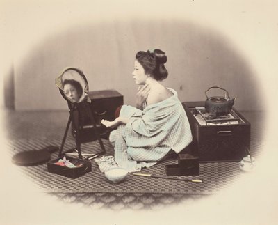 Mulher a arranjar-se de Felice Beato