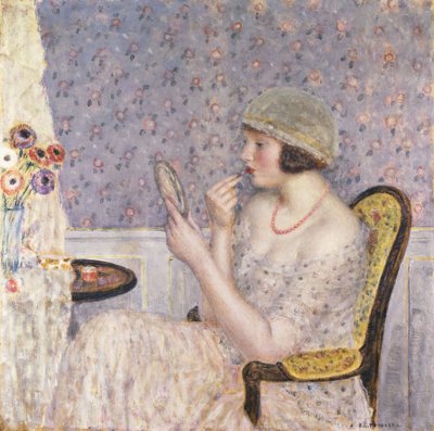 Mulher em uma penteadeira de Frederick Carl Frieseke