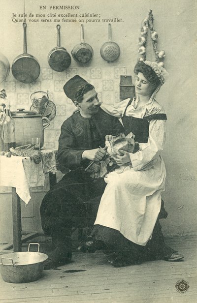 Serva garota sentada no joelho do homem na cozinha de French Photographer