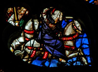 A rosácea oeste retratando uma cena do livro do Apocalipse: Fiel e verdadeiro, o rei dos reis num cavalo branco, com dois outros guerreiros para trás (19: 11-16) de French School