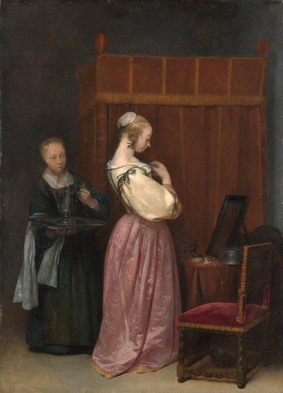 Mulher jovem tem a sua casa de banho de Gerard Terborch