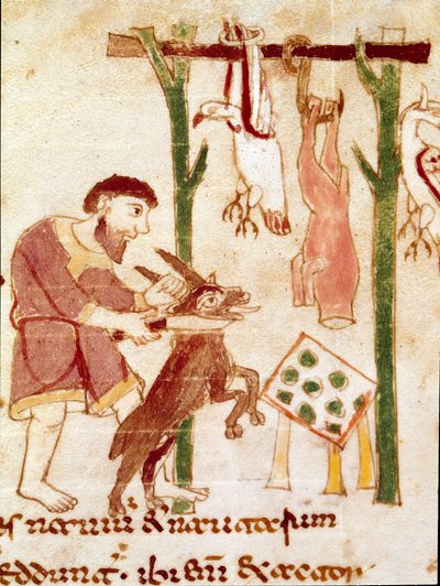 Um açougueiro corta uma cabra (miniatura, século IX) de German School