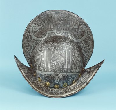 Um pente morion, gravado com cabeças de querubim, esfinges e cavalos alados, o centro com um guerreiro pseudo clássico em armadura contemporânea com espada e escudo de German School