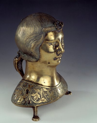 Aquamanile (bacia para lavar as mãos do padre durante a missa) em bronze dourado na forma do busto de um jovem. 1300-1325. De Hildesheim. Sol 0,23x0,19 m Paris, museu nacional da Idade Média, Termas de Cluny. de German School