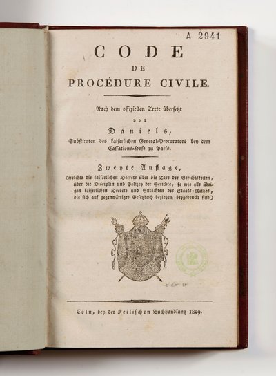 Código Napoleônico de processo civil para os departamentos franceses da margem esquerda do Reno, aberto na página de título, Koln, 1809 (impresso) de German School