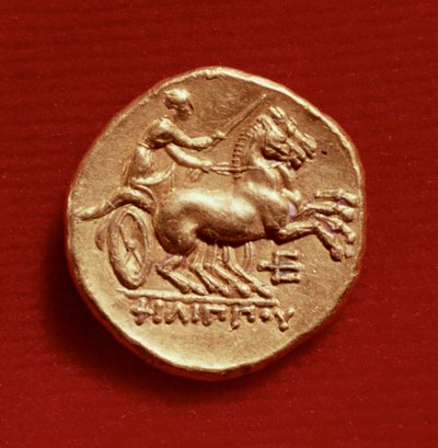 Reverso de um stater de Filipe II (382-336 aC) da Macedônia representando um cocheiro, 356-336 aC (ouro) de Greek School