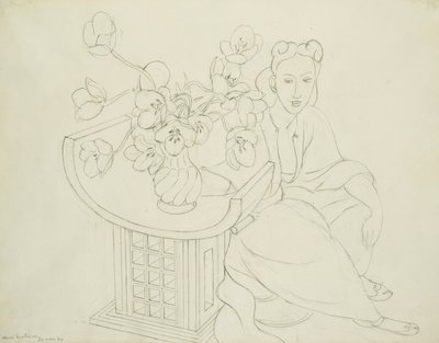 Mulher sentada com vaso de tulipas de Henri Matisse