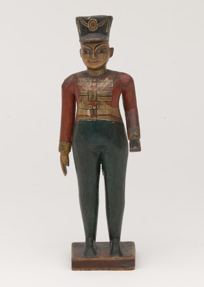 Figura esculpida em madeira de um oficial britânico da 3ª Madras de Indian School