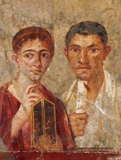 Um fresco romano encontrado em Pompeia mostra um casal a segurar instrumentos de escrita. Museo Archeolo... de James L Stanfield