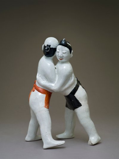 Lutadores, japoneses, provavelmente do século XVII (louça de barro com subvidrado policromado) de Japanese School