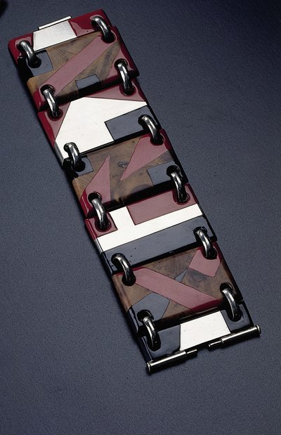 Pulseira Thuya, c.1930 (laca preta e vermelha cromada) de Jean Dunand