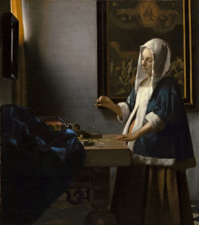 Mulher a segurar uma balança de Johannes Vermeer