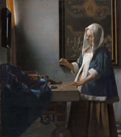 Mulher a segurar uma balança de Johannes Vermeer