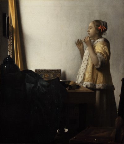 Jovem senhora com um colar de pérolas de Johannes Vermeer