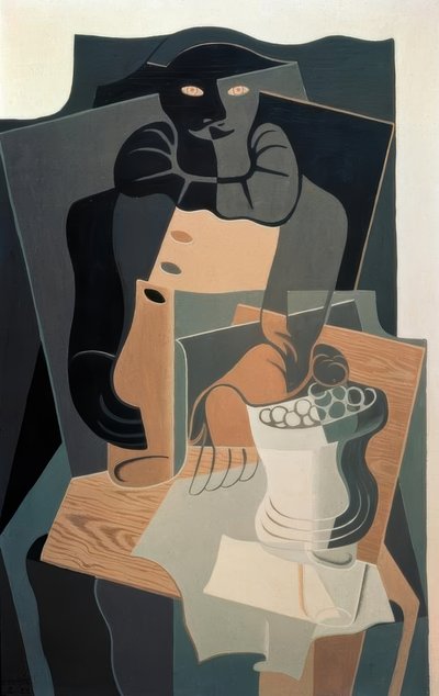 Arlequim à mesa de Juan Gris
