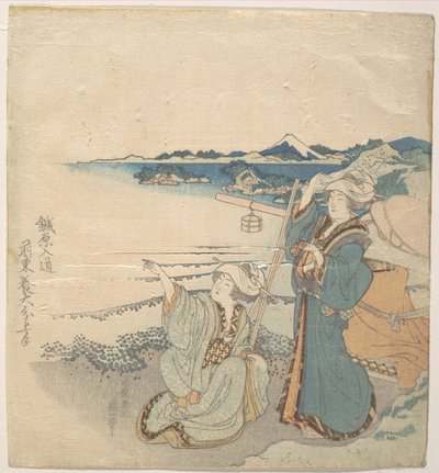 Duas jovens na praia; uma delas a apontar de Katsushika Hokusai