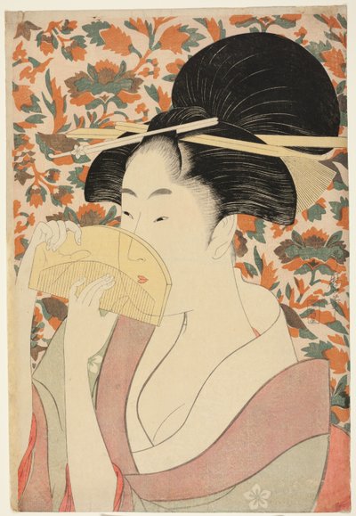 Mulher segurando um pente de cabelo de tartaruga de Kitagawa Utamaro