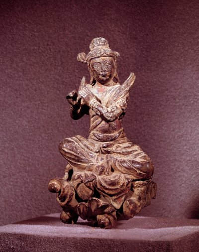Art Coreen: representação de um Apsara em bronze dourado, sendo Celeste. Período Silla (séc. VII-XII). Museu Nacional da Coréia de Korean School