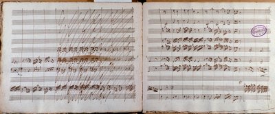 Página dupla, assinada pelo autor da partitura para o Concerto para violoncelo e orquestra em Mi bemol de Luigi Boccherini de Luigi Boccherini