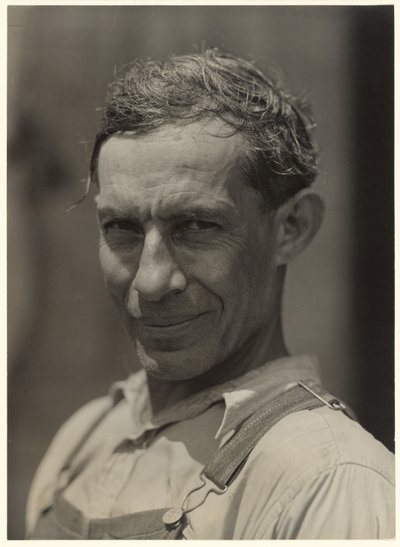 Mulato Trabalhador na plantação de algodão de John Henry. Tinha talento para o artesanato e para a tecelagem.  Melrose, Louisiana de Marion Post Wolcott
