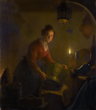 Mulher em uma cozinha à luz de velas de Michiel Versteegh