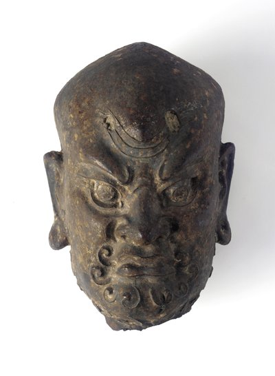 Cabeça de uma divindade (ferro) de Ming Dynasty Chinese School