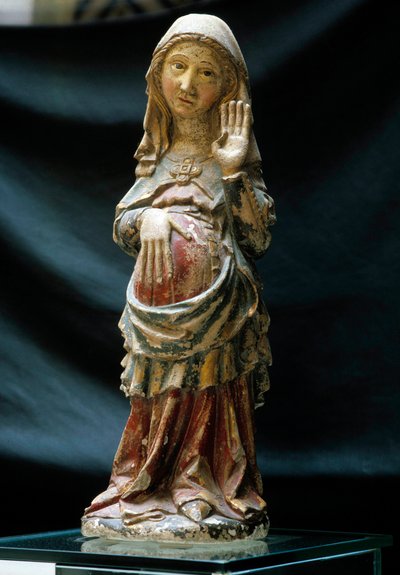 Arte portuguesa: representação da Virgem grávida com uma mão na barriga. Escultura em pedra policromada de Portuguese School