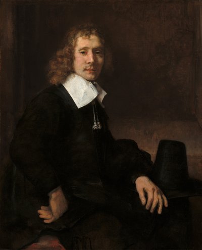 Um jovem sentado em uma mesa possivelmente Govaert Flinck, c. 1660. de Rembrandt van Rijn