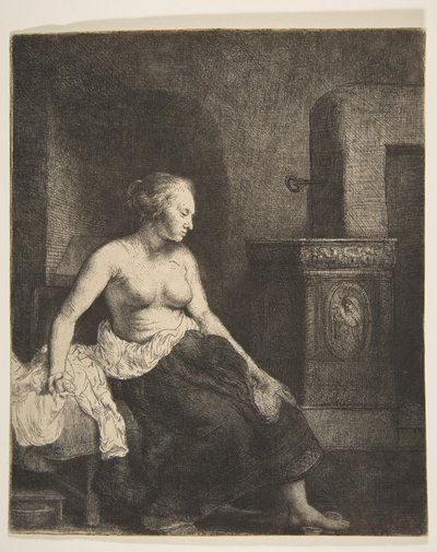 Mulher sentada seminua ao lado de um fogão, 1658. de Rembrandt van Rijn