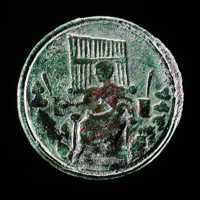 Moeda romana que representa um órgão (bronze) de Roman