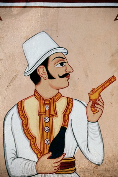 Pintura mural de um soldado britânico segurando uma pistola, Jaipur, Rajastão, Índia de School Indian