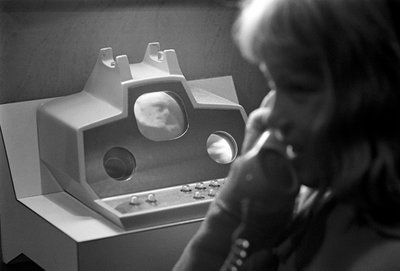 Demonstração da tecnologia futurista de comunicações Picturephone na Feira Mundial de Seattle de Ted Spiegel