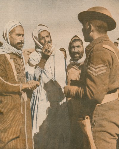 Árabes tunisinos dão as boas-vindas a um sargento britânico em Chaouach, 1943 de Unbekannt