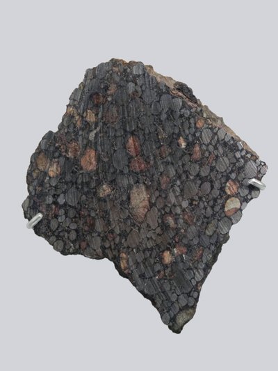Condrite de Carbono (CBA). Tombado em Gujba (Nigéria), em 1984. Museu Nacional de História Natural, Paris. de Unbekannt