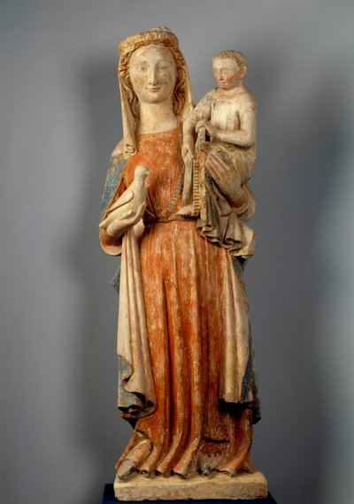 Virgem e Criança A Virgem segura uma pomba na mão. Escultura em pedra policromada. Século XV. Igreja de Montaigu les Bois. de Unknown artist