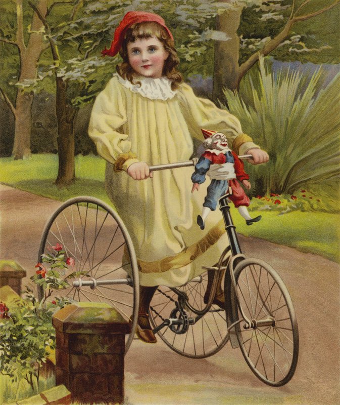 Menina andando de triciclo no jardim de English School