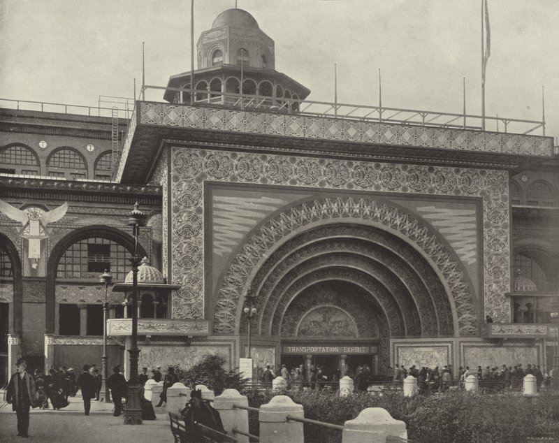 A porta dourada do edifício de transporte de American Photographer
