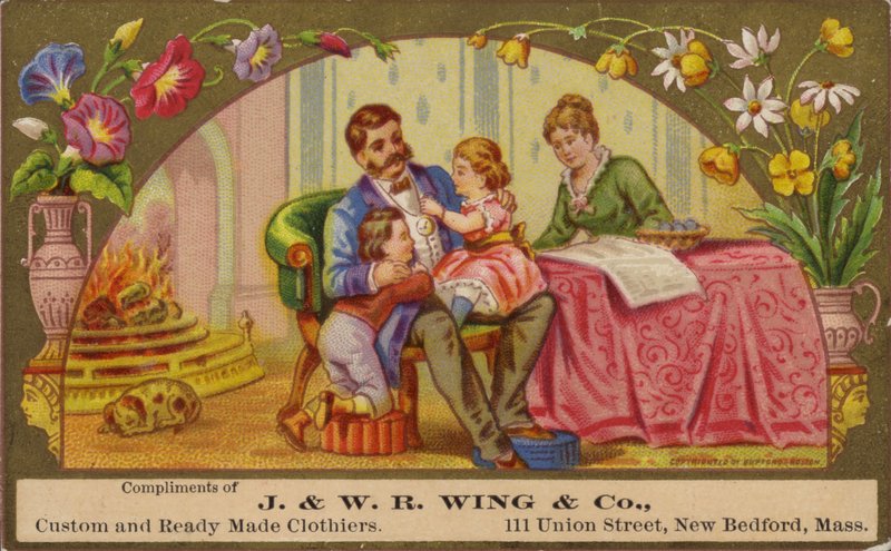 Família relaxante pelo fogo de American School