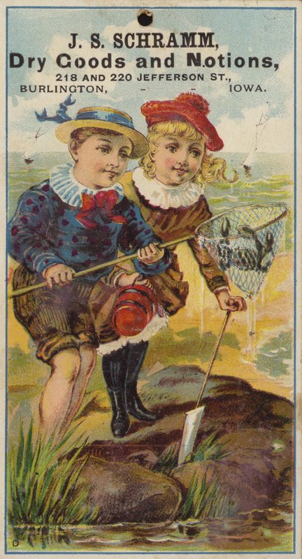 Menina e menino Crabbing na Rock Pool de American School