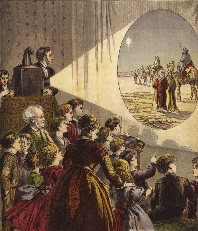 Crianças assistindo Magic Lantern Show da história de Natal de English School